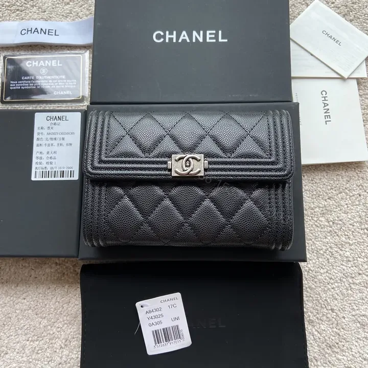 View 1 of Noir Quilted Leather Wallet on Chain: Chanel-Inspired Elegance