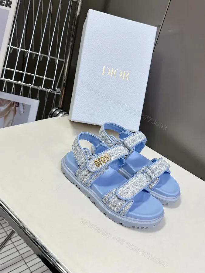 View 1 of Soft-Gleam Crest Sandals: Light-Blue Textured Straps, Minimal Logo