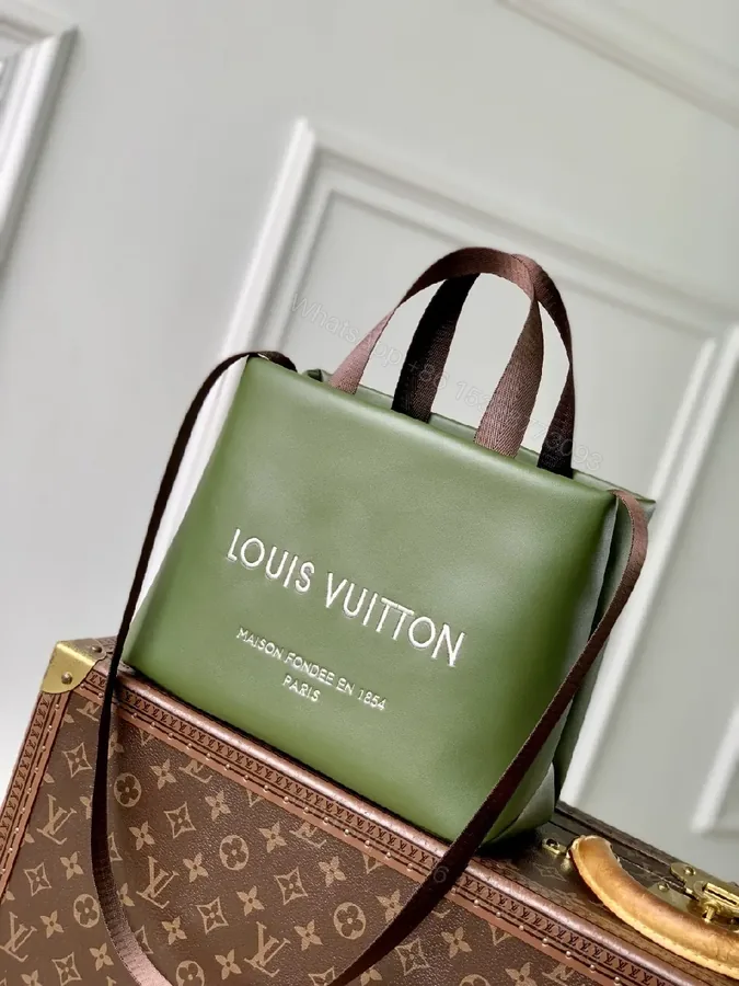 View 1 of Green Leather Tote with Bold Branding, Coordinated Straps
