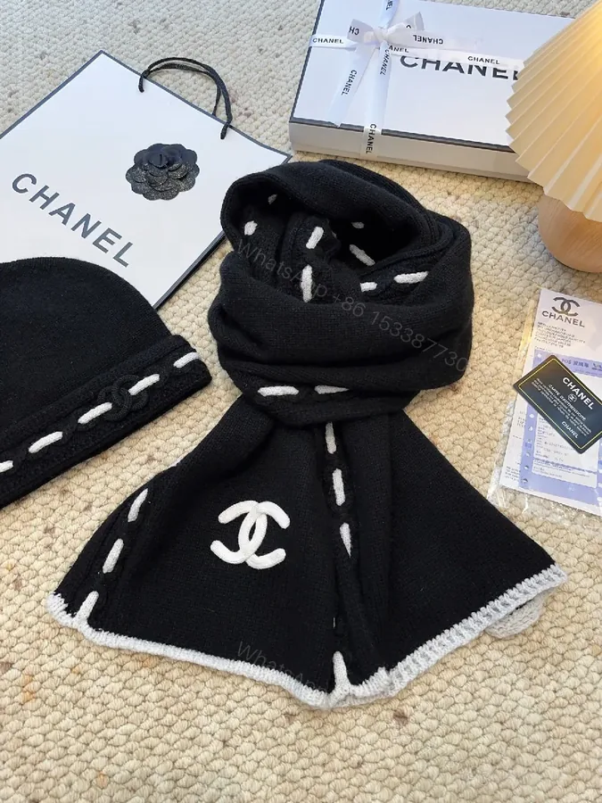 View 1 of Black Knit Scarf with White Stitching — Luxury Cozy Accessory