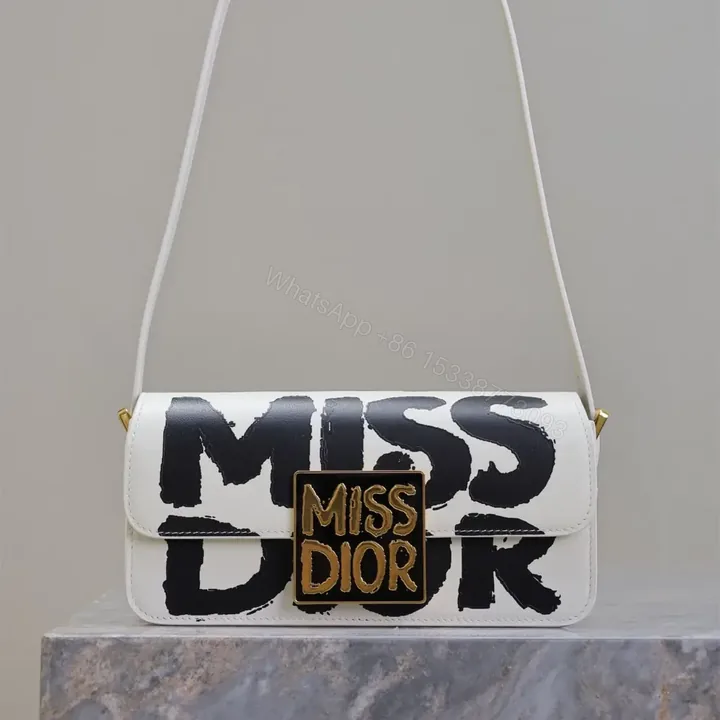 View 1 of 高仿Dior*Miss系列M261M933小牛皮塗鴉字面腋下包白色免檢版