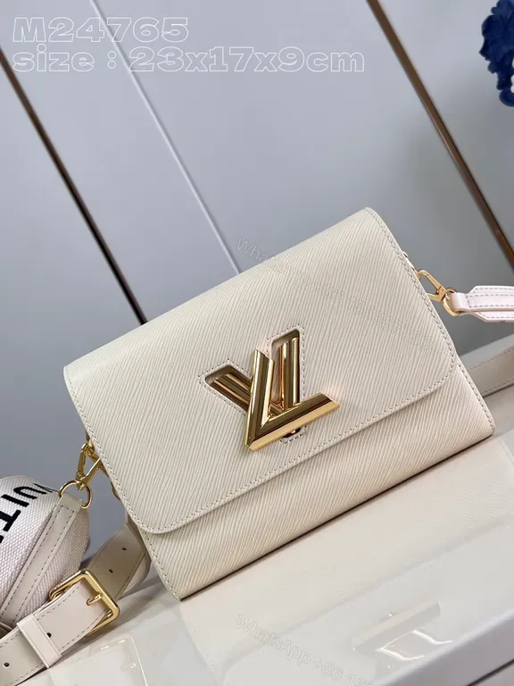 View 1 of Elegant Compact Crossbody with Gold LV-Inspired Hardware