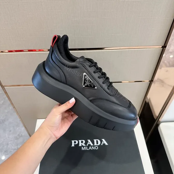 View 1 of Bold Black Leather Platform Sneaker â€” Prada Milano Style