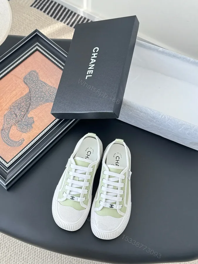 View 1 of Chanel Women Light Green Canvas Sneakers
