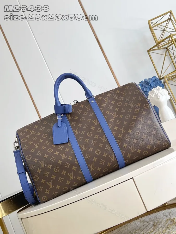 View 1 of Blue-Accented Monogram Weekender Duffel