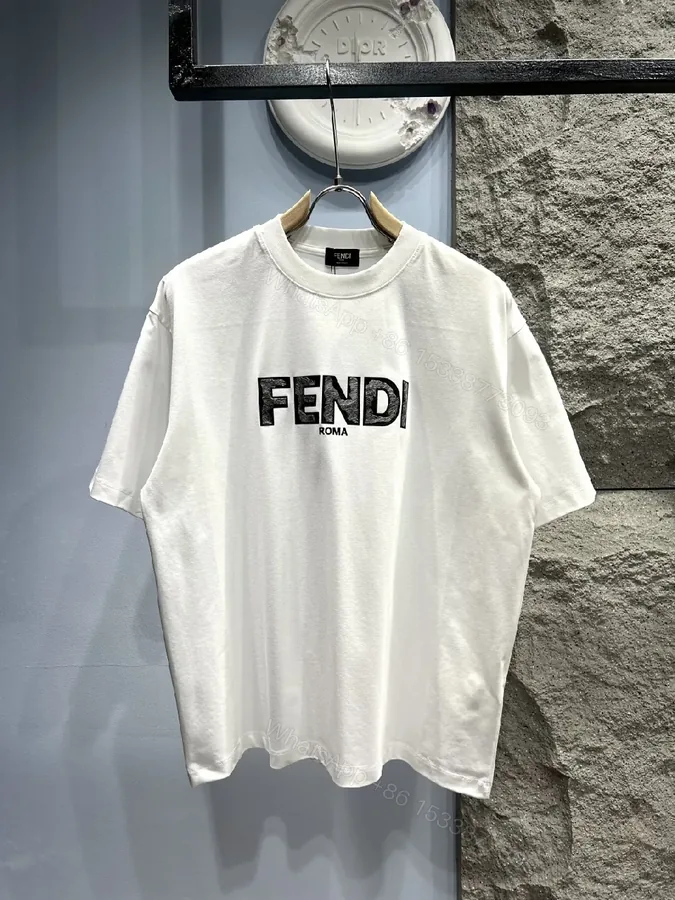 View 1 of White Cotton Logo Tee - Minimalist Luxury, Relaxed Fit, Front Fendi-Inspired Emblem