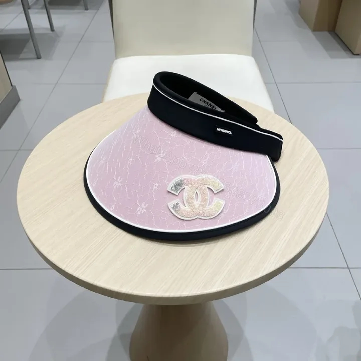 View 1 of Pink Visor with Chanel-Inspired Logo - Luxe Everyday Accessory