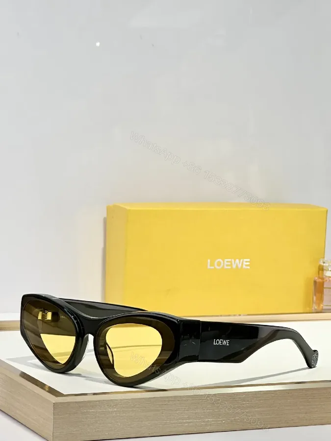 View 1 of Bold Black Acetate Cat-Eye Sunglasses with Polarized Yellow Lenses