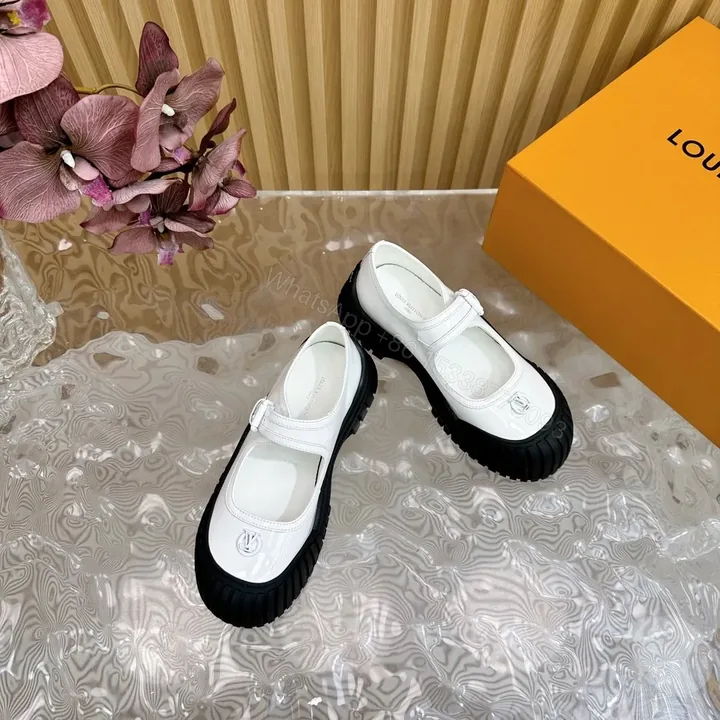 View 1 of LV Women White Patent Leather Rubber Toe Mary Janes