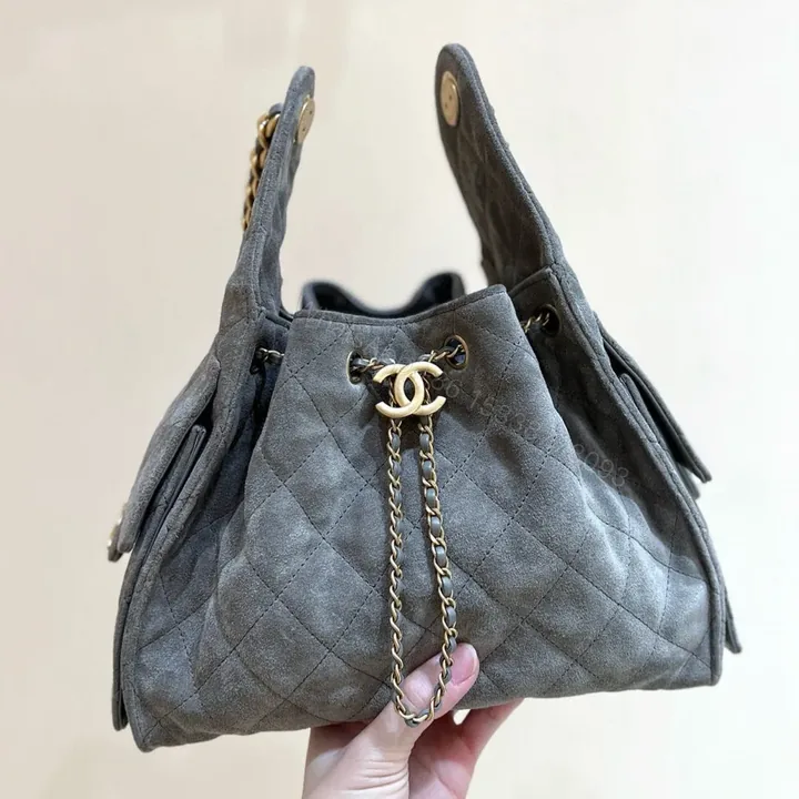 View 1 of CHANEL 25 HANDBAG IN GREY 30 SUEDE GOLD HARDWARE