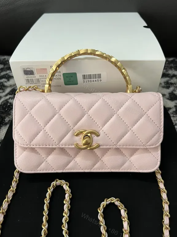 View 1 of Chanel-Inspired Pink Quilted Leather Mini Bag with Gold Chain
