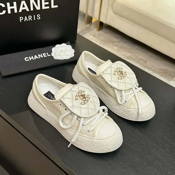 View 1 of Quilted Leather Slip-On Sneakers with Crest Embroidery