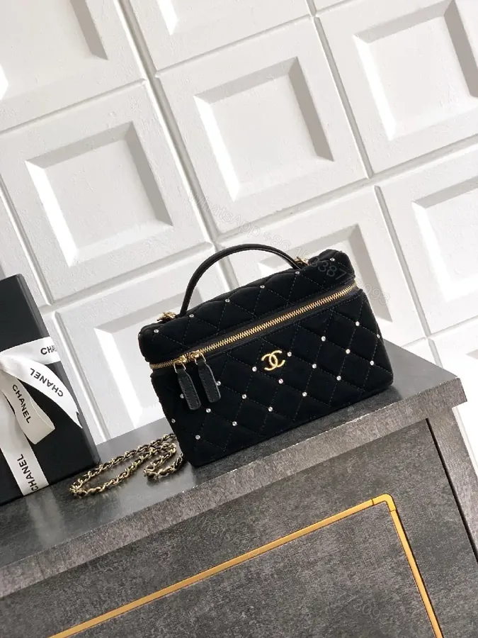 View 1 of Velvet Quilted Crossbody Mini Bag with Gold Hardware