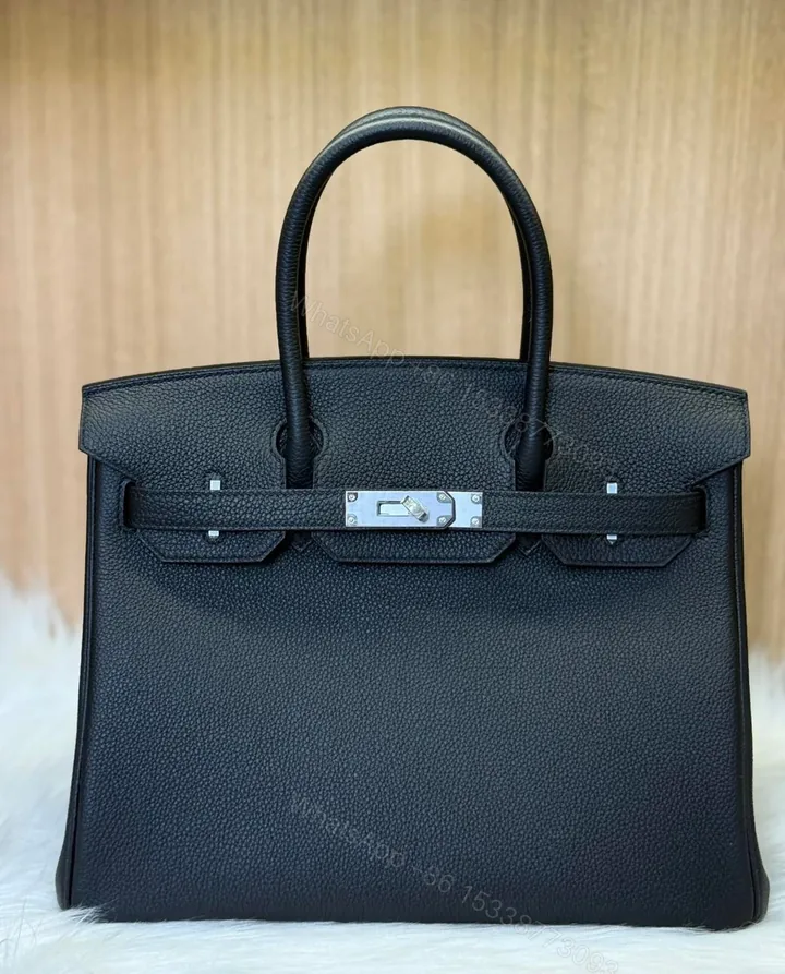 View 1 of HERMES BIRKIN 25 BLACK TOGO LEATHER WITH PALLADIUM HARDWARE