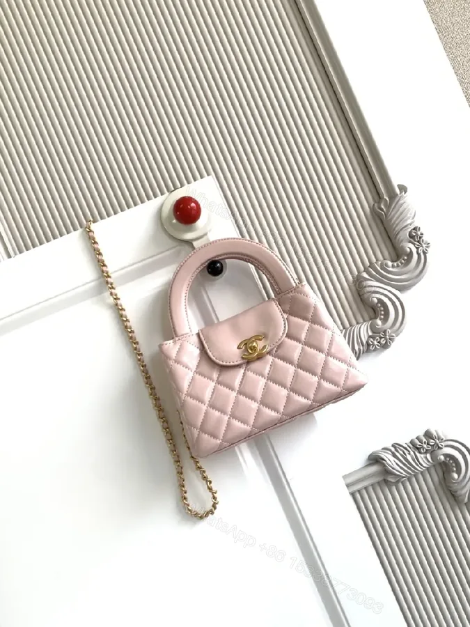 View 1 of Soft Pink Leather Quilted Mini Bag with Gold Hardware