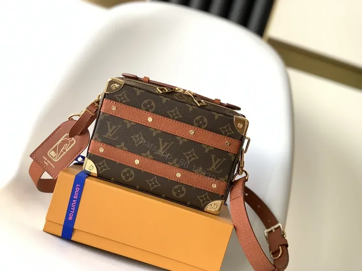 View 1 of Compact Monogram Crossbody with Striped Leather Accents