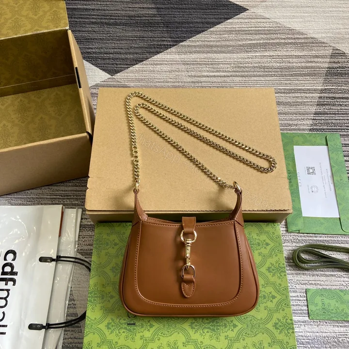 View 1 of JACKIE NOTTE MINI BAG 19 IN TAWNY BROWN CALFSKIN GOLD HARDWARE