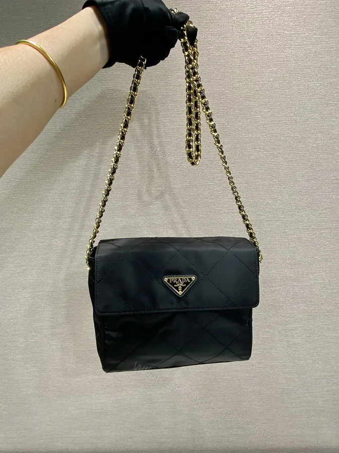 View 1 of LARGE QUILTED FLAP BAG 23 IN BLACK RE-NYLON FABRIC GOLD CHAIN