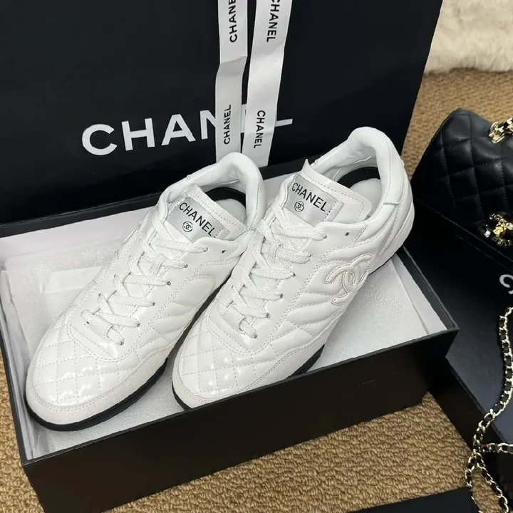 View 1 of White Quilted Leather Sneakers: Timeless Luxury Minimalist Comfort