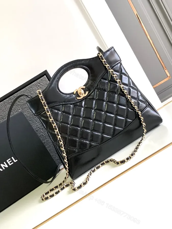 View 1 of Quilted Leather Handbag: Black, Gold Chain, Luxe Everyday Style
