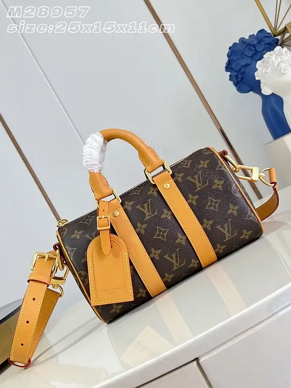 View 1 of Dark Brown Monogram Canvas Duffel Bag with Leather Trims