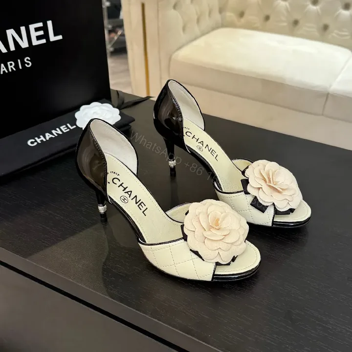 View 1 of Cream Quilted Leather Heels with Flower Accent, Open-Toe, Kitten Heel