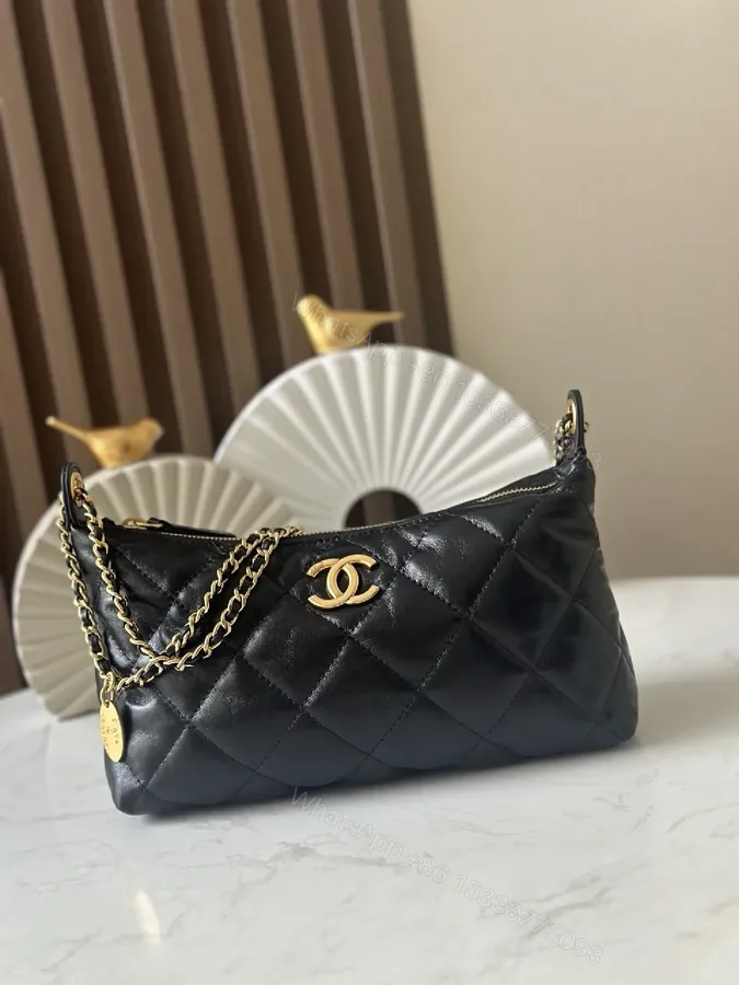 View 1 of Quilted Black Leather Shoulder Bag — Timeless Luxury, Day-to-Night