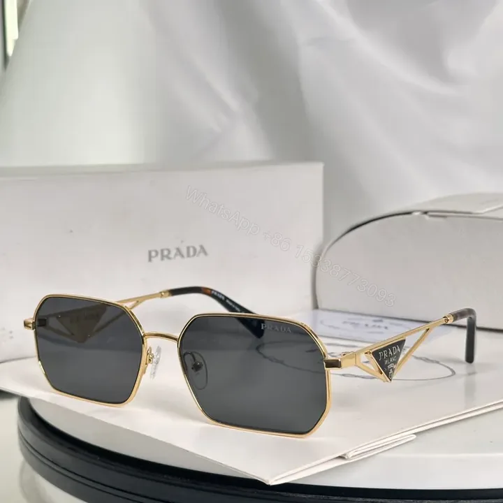 View 1 of Geometric Luxe Sunglasses: Gold-Tone Frame, UV Glasses, Prada-Style Luxury