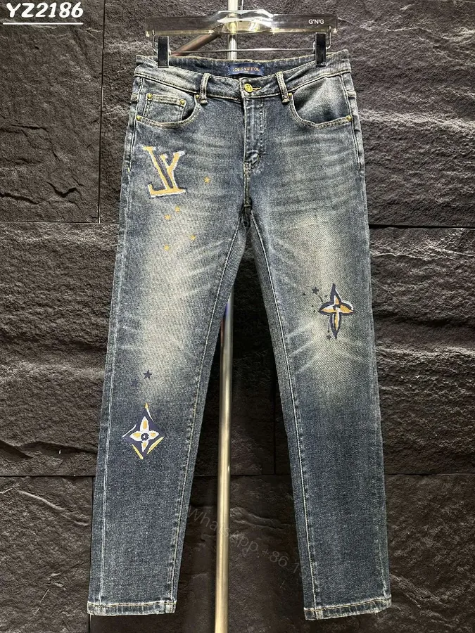 View 1 of Distressed Indigo Jeans with LV-Inspired Embellishments - Denim Luxe style