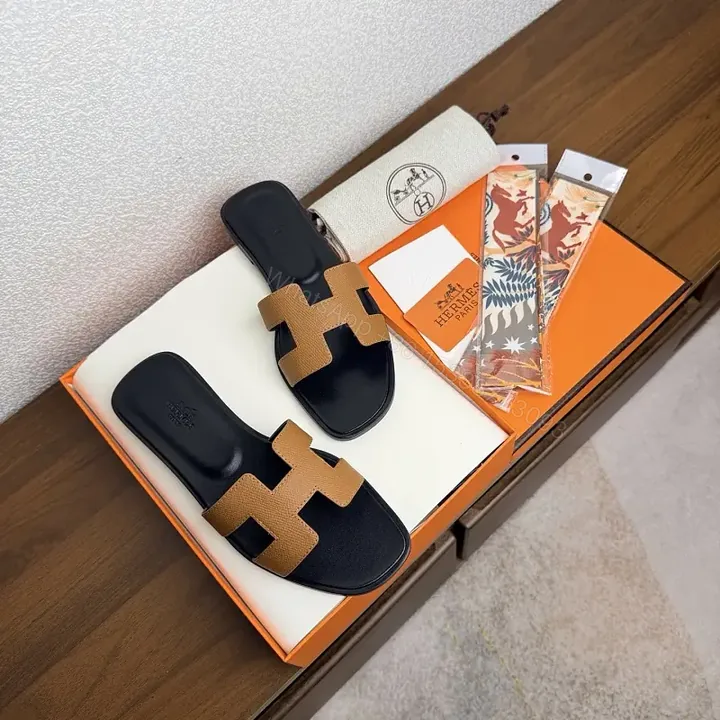 View 1 of Brown Leather Hermes-Style Sandals with Signature H Strap Slides
