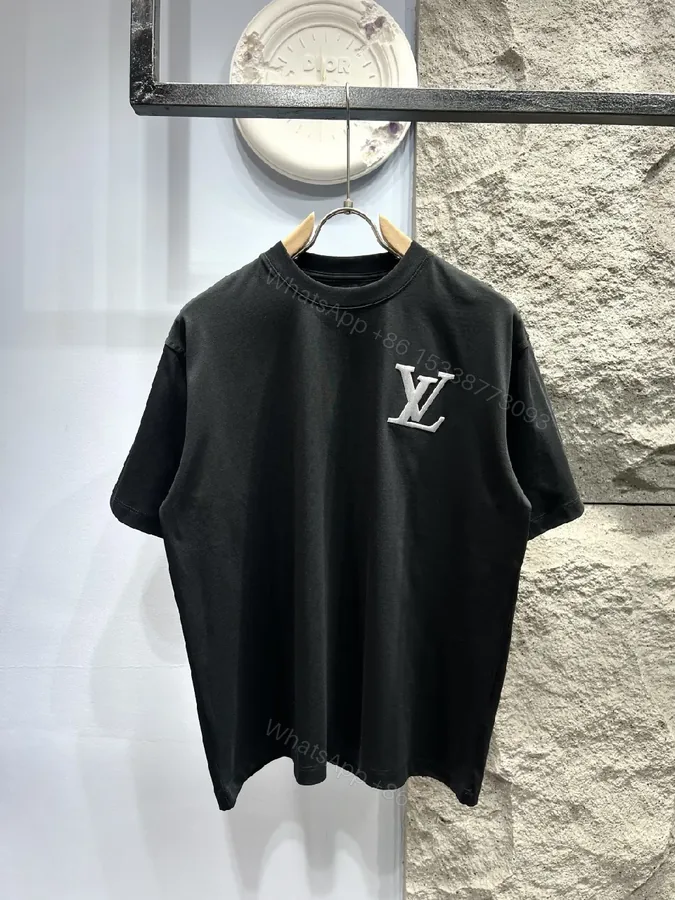 View 1 of Black Emblem Tee: Subtle Luxury Everyday Wear