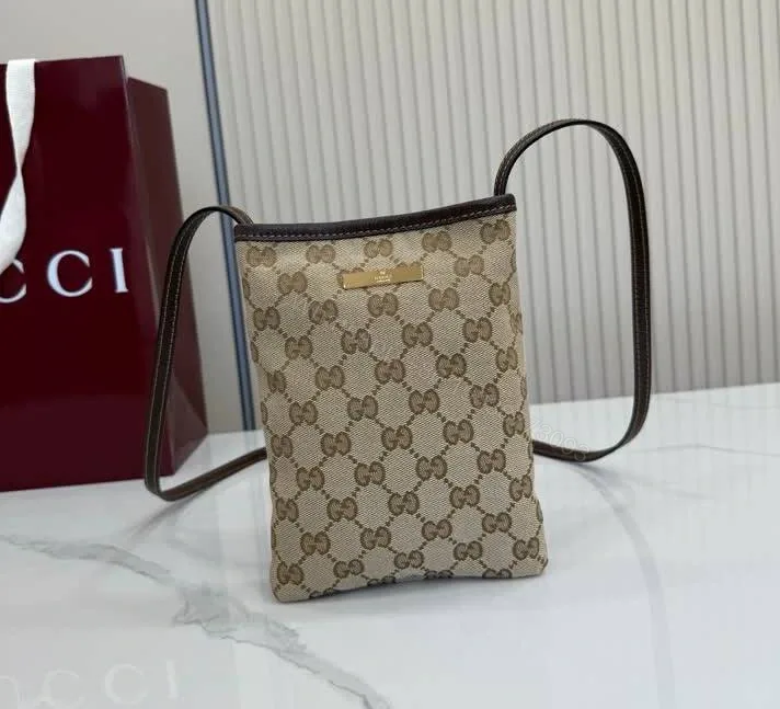 View 1 of Gucci Replica Mini GG Canvas Crossbody Bag 875806