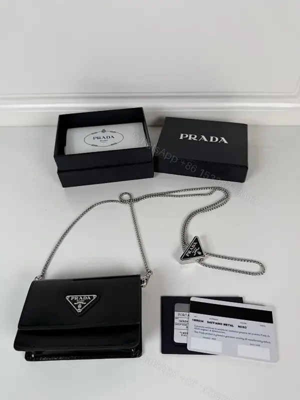 View 1 of Chic Black Leather Mini Bag with Signature Logo Chain