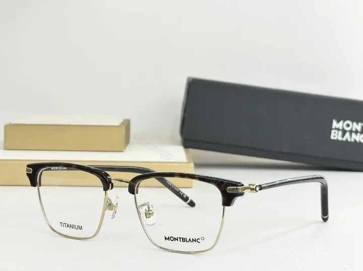 View 1 of Refined Titanium Half-Rrow Eyewear: Subtle Texture, Clarity