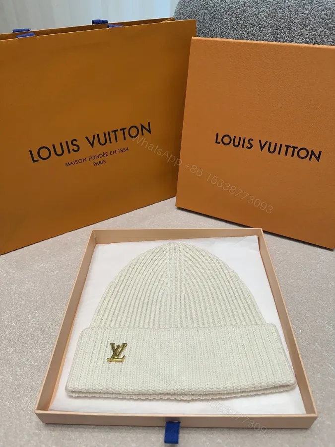 View 1 of Textured Knit Beanie - Ivory Knit w/ LV Accent Fashion Beanie