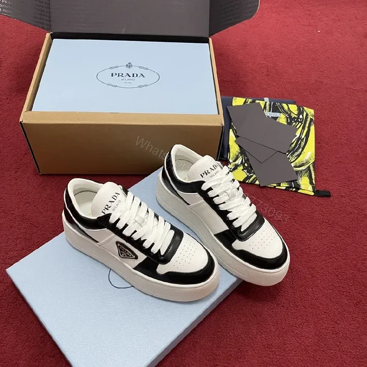 View 1 of Modern Leather-Trim Low-Top Sneakers: Bold Contrast, Supreme Craft