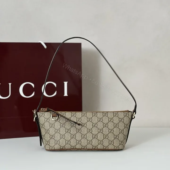 View 1 of Mini Canvas Crossbody: Compact Luxury Shoulder Bag