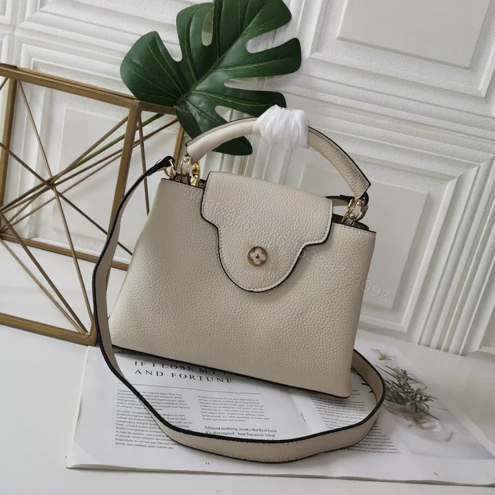 View 1 of Louis Vuitton Capucines Eggshell