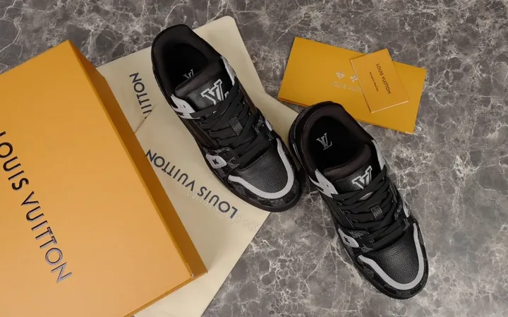View 1 of Black Leather + Suede High-Tops + Modern Luxury + Signature LV Detailing + Sneakers