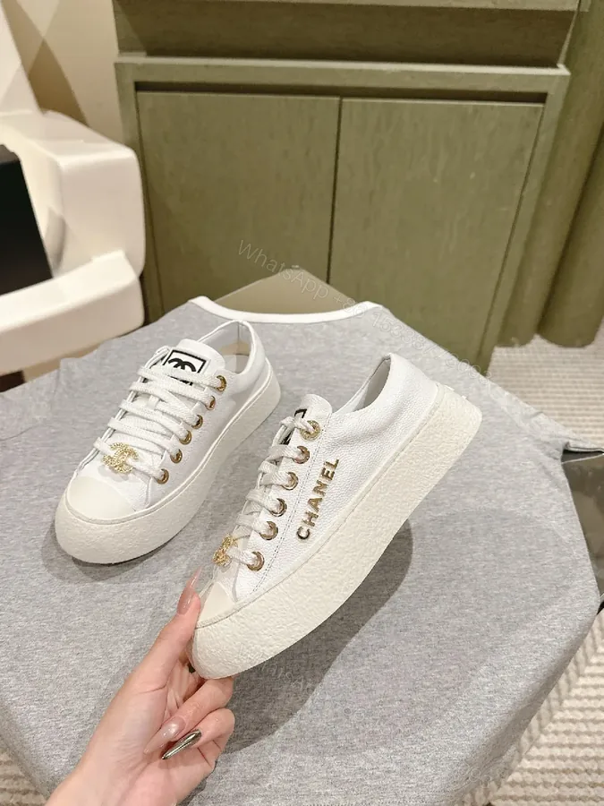 View 1 of White Leather High-Top Sneakers with Gold Accents