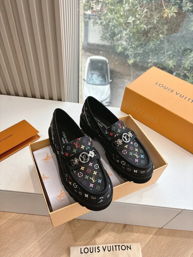 View 1 of LV Women Black Patterned Leather Loafers
