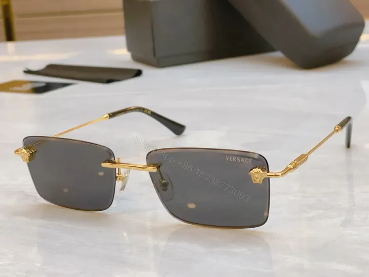 View 1 of Gold-Tone Wayfarer Rimless Sunglasses â€” Luxury Versace-Style, UV400 Protection
