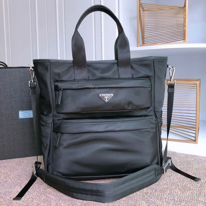 View 1 of TOTE BAG 38 IN BLACK RE-NYLON AND SAFFIANO LEATHER TRIM