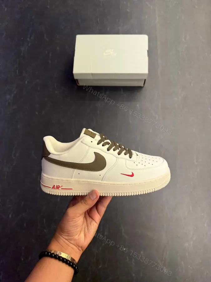 View 1 of First Copy Nike Air Force 1 White Sneakers with Brown Swoosh