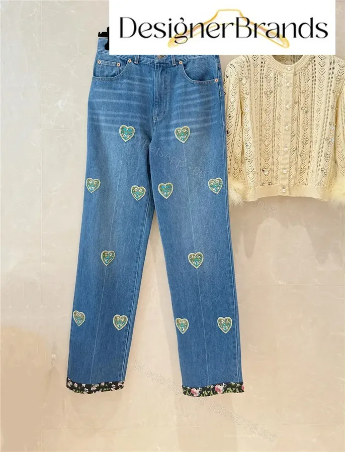 View 1 of Valentino Garavani Embroidered Straight-Leg Jeans