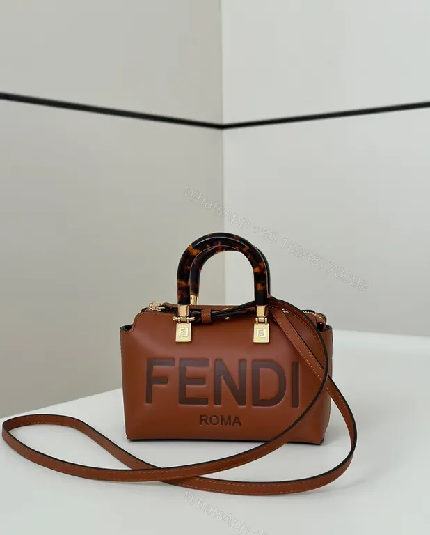 View 1 of Tan Leather Crossbody with Fendi Roma Monogram Crossbody Bag