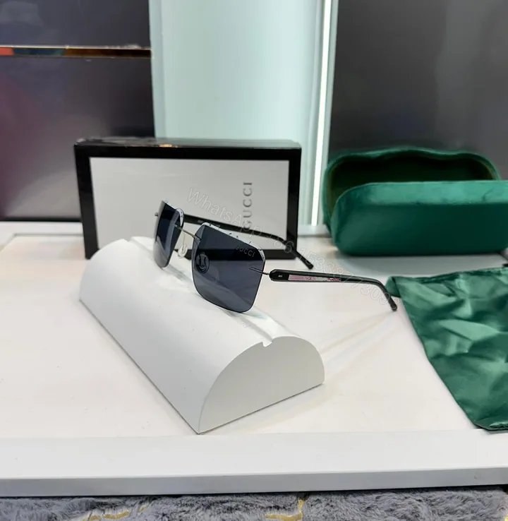 View 1 of Gucci Rectangular Rimless Sunglasses Black-Silver