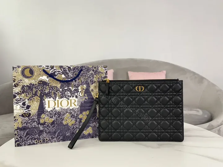 View 1 of Chic Quilted Leather Clutch with Gold Hardware â€“ Black
