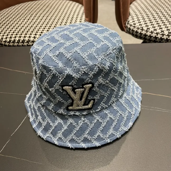 View 1 of Textured Denim Bucket Hat with LV Emblem