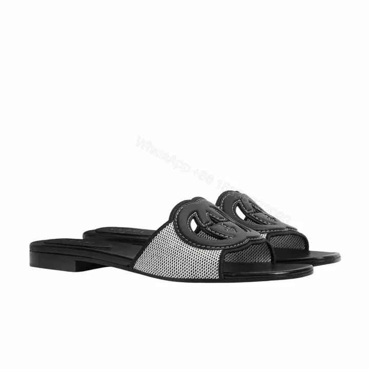 View 1 of GUCCI WOMEN’S INTERLOCKING G SLIDE SANDAL BLACK WHITE 835723 FAEA0 8543